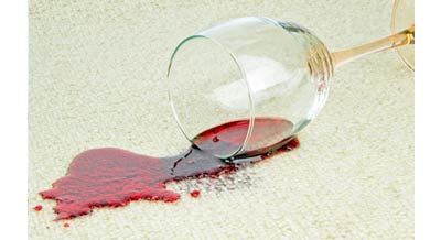 spilt red wine on a rug